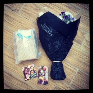 Prestige Flowers cards, vase, and luxury bouquet.