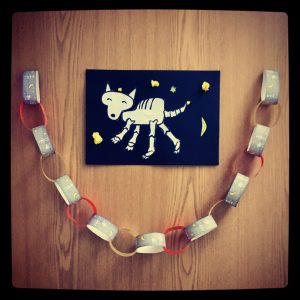 Hallowe'en paperchains and Funnybones dog skeleton collage.