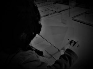 Interview with Chris Scott; Chris' son with a microscope.